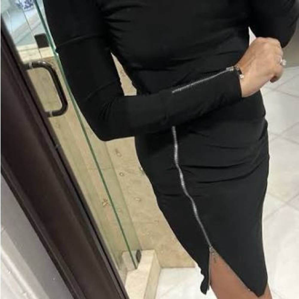 Black Dress from Cache. Very flattering.